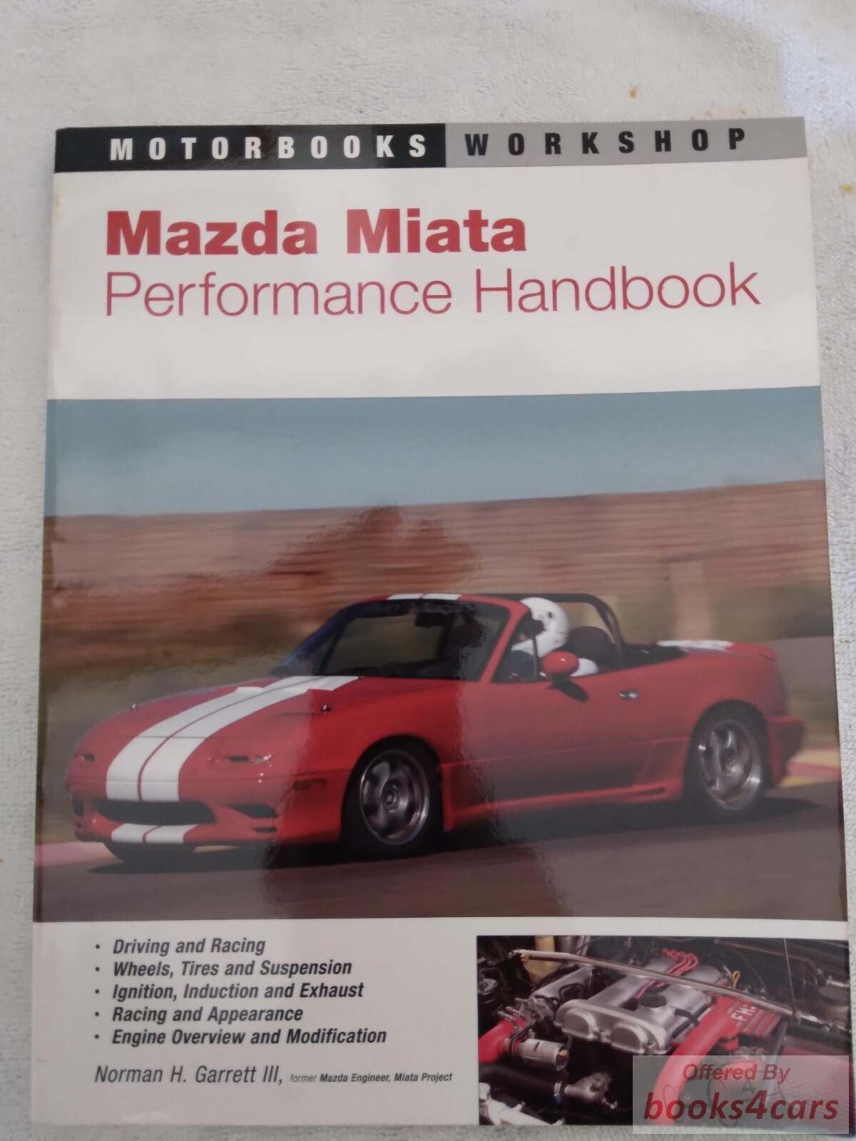 view cover of Mazda Miata performance handbook by N. Garrett. component by component performance modification & tuning; 160 pgs.