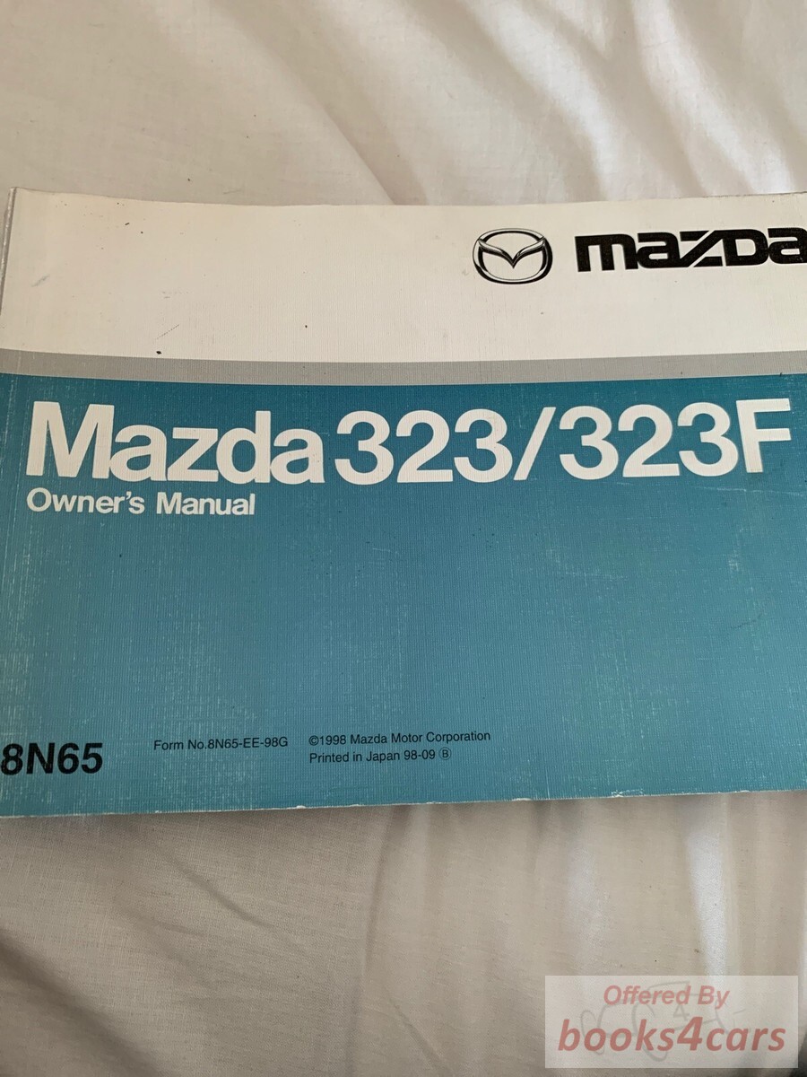 view cover of 1994-1998 323f Owners Manual by Mazda