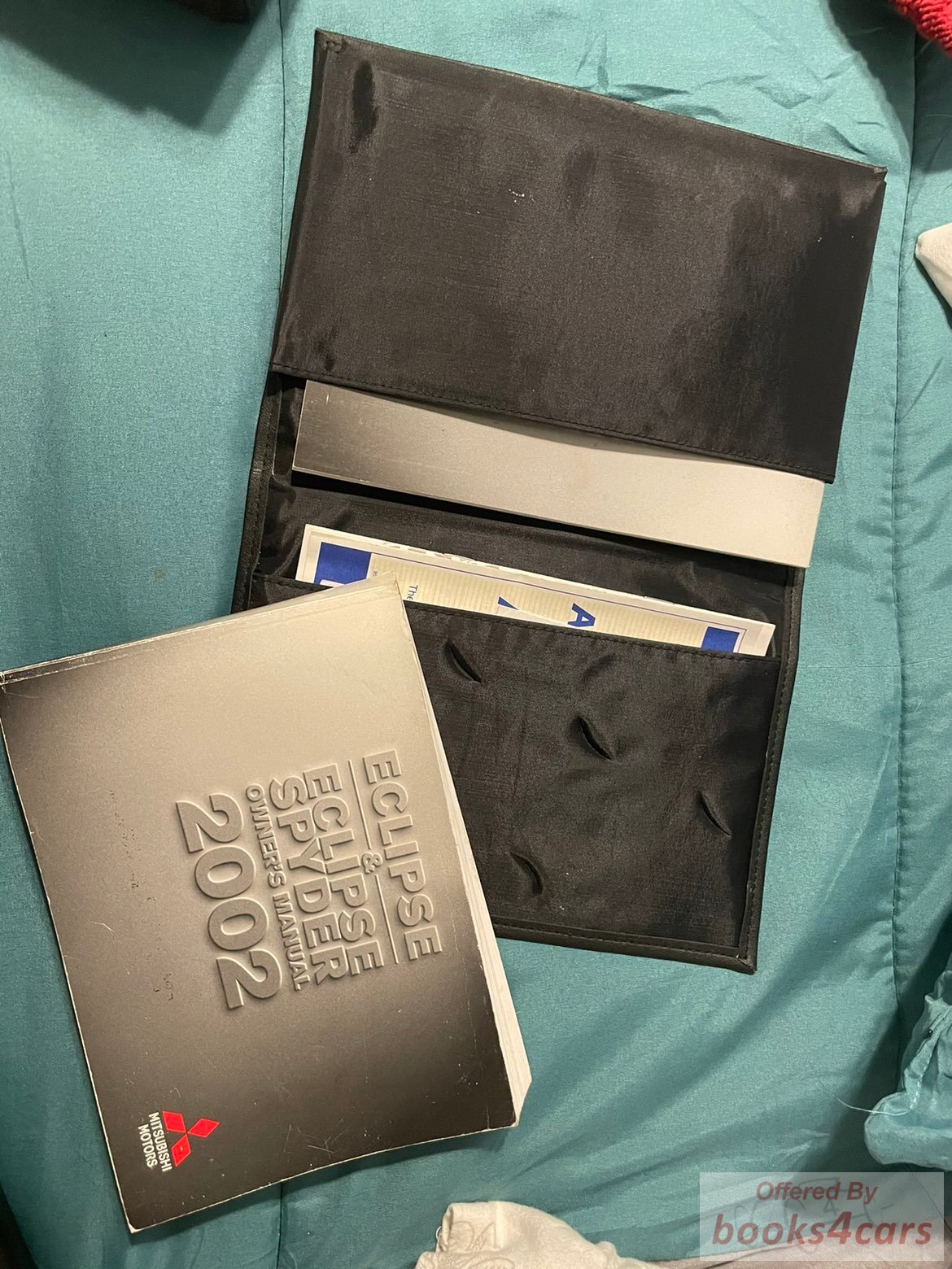 view cover of 2002 Eclipse Owners Manual By Mitsubishi