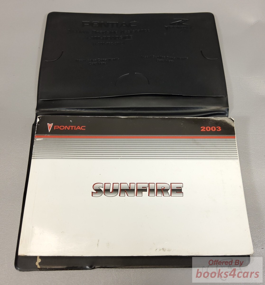 view cover of 2003 Sunfire Owners Manual by Pontiac