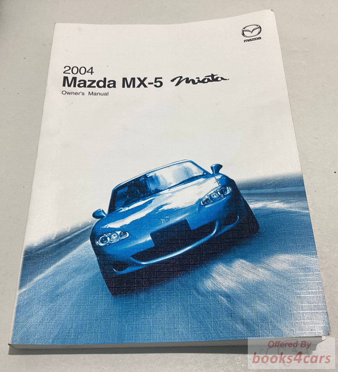 view cover of 2004 Mazda Miata MX-5 Owners Manual